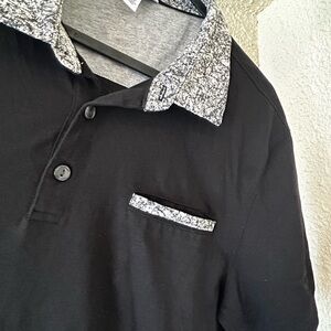 Calvin Klein Black and White Polo with Patterned Accents